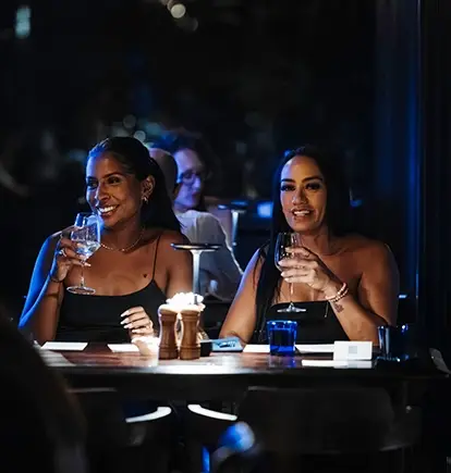 Two women are drinking at the table of Nautilus